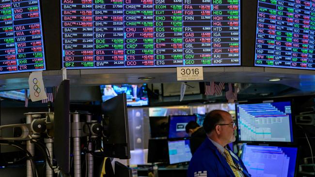 Traders work during the opening bell at the New York Stock Exchange. Picture: AFP