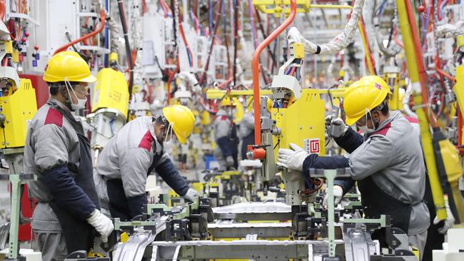 An ever-shrinking pool of workers will chip away at China’s position as the ‘factory of the world’. Picture: AFP) / China OUT