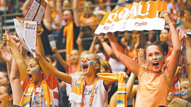 Giants fans celebrate after their round one victory in Super Netball.
