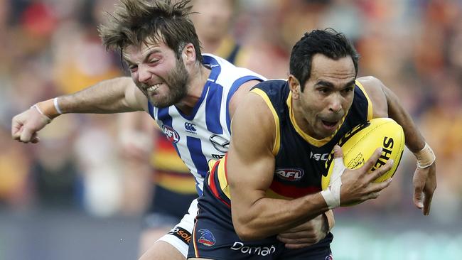 Adelaide’s Eddie Betts breaks free from North Melbourne’s Luke McDonald. Picture Sarah Reed