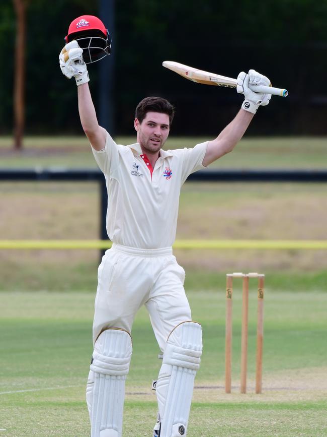 Ash Armstrong celebrates his century against Geelong. Picture: Stephen Harman