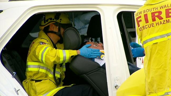 Mr Mehajer is pulled from his damaged vehicle after the prang. Picture: Seven News