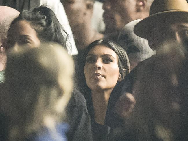 So in love ... Kim Kardishan watches her husband Kanye West performing on the Pyramid Stage at the Glastonbury Festival. Picture: Ben Birchall/PA Wire