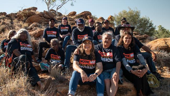 Senator Jacinta Nampijinpa Price and Warlpiri community members who part of the No campaign.. Back Row – Ned Gallagher, Melissa May, Jono Oldfield, Grantley Marshall, Matthew Egan. Front Row – Bess Nungarrayi, Bess Micheals, Daniel Gallagher, Senator Jacinta Nampijinpa Price , Timothy Jangala, Geoff Miller, Joanie, Shanelle Collins.Picture Pin Rada