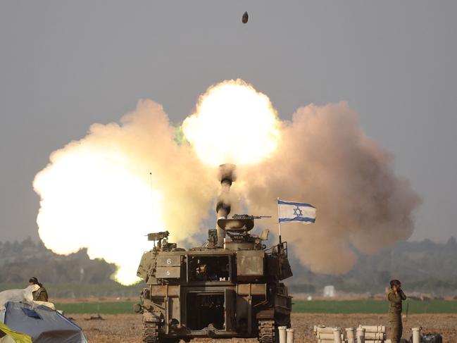 Israeli forces shell the Gaza Strip from the border area in southern Israel. Picture: AFP