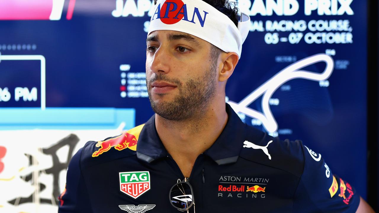SUZUKA, JAPAN - OCTOBER 04: Daniel Ricciardo of Australia and Red Bull Racing looks on in the garage during previews ahead of the Formula One Grand Prix of Japan at Suzuka Circuit on October 4, 2018 in Suzuka. (Photo by Mark Thompson/Getty Images)