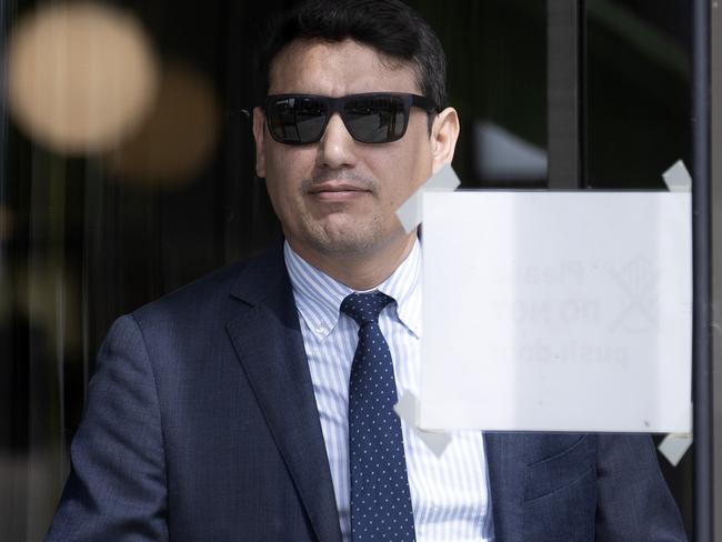 Witness Carlos Ramos, a Parliament House cleaner, leaving court on day six of the trial.