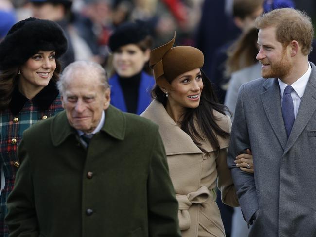 Kate Middleton, Prince Philip, Meghan Markle, and Prince Harry, walk to the traditional Christmas Day church service in Sandringham. Picture: AP/Alastair Grant