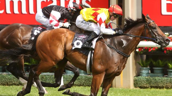 Flemington races on New Year's Day. Race 6 won by no 9 Decircles ridden by Stephen Baster. Picture: Stuart Milligan