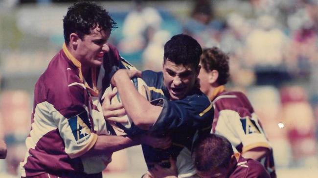 North Queensland Cowboy John Rowbotham playing against the Brisbane Broncos in an under-17s match in 1997.