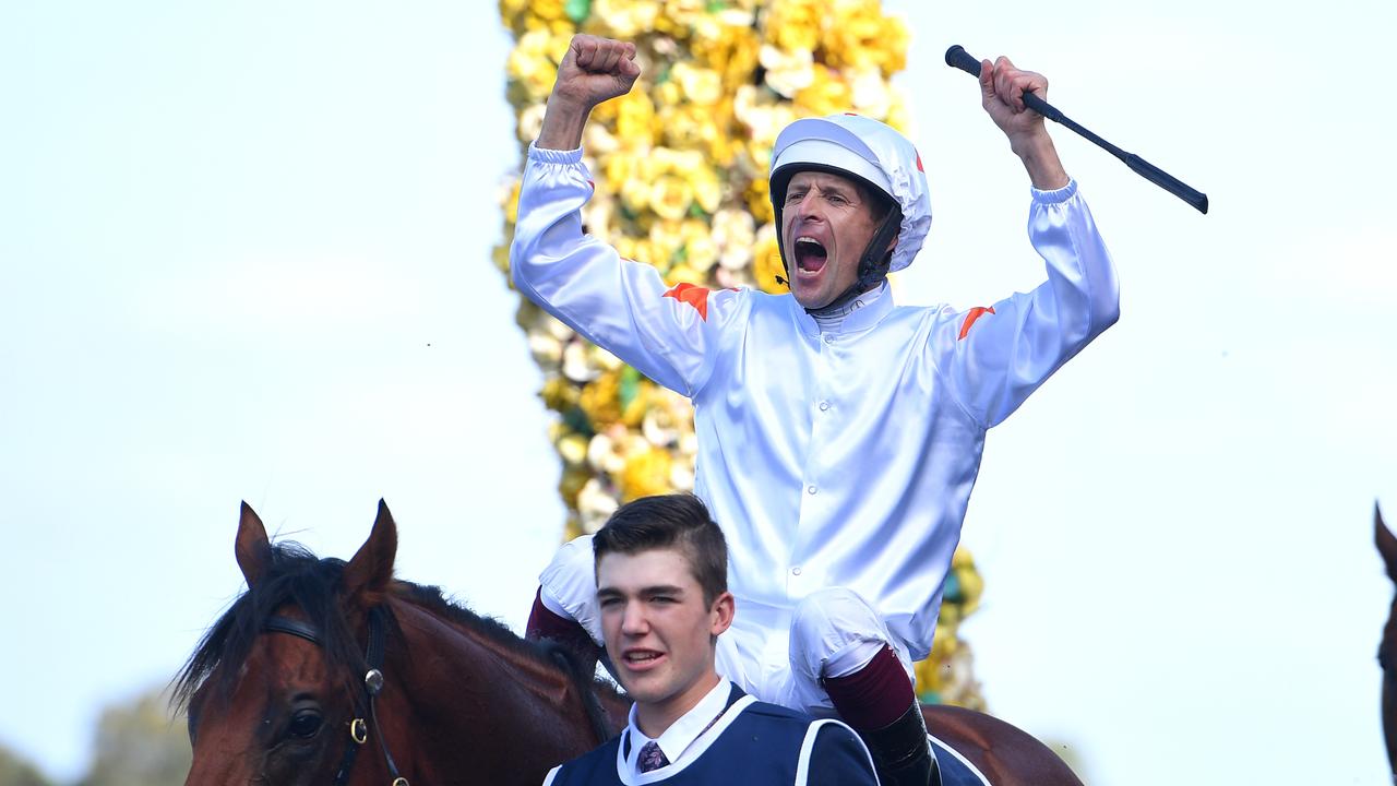 Jockey Hugh Bowman celebrates after riding Farnan to victory in last year’s Golden Slipper. (AAP Image/Dan Himbrechts)