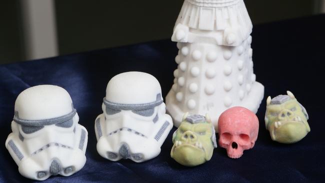 Stormtrooper and other figurines made with a 3D printer. Picture: Jono Searle