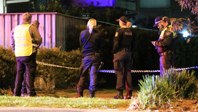 Police at the scene in Narraweena after a police officer was stabbed and man shot. Picture: Christian Gilles