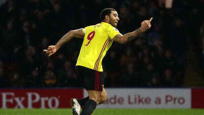 Troy Deeney of Watford reacts after scoring the first goal.