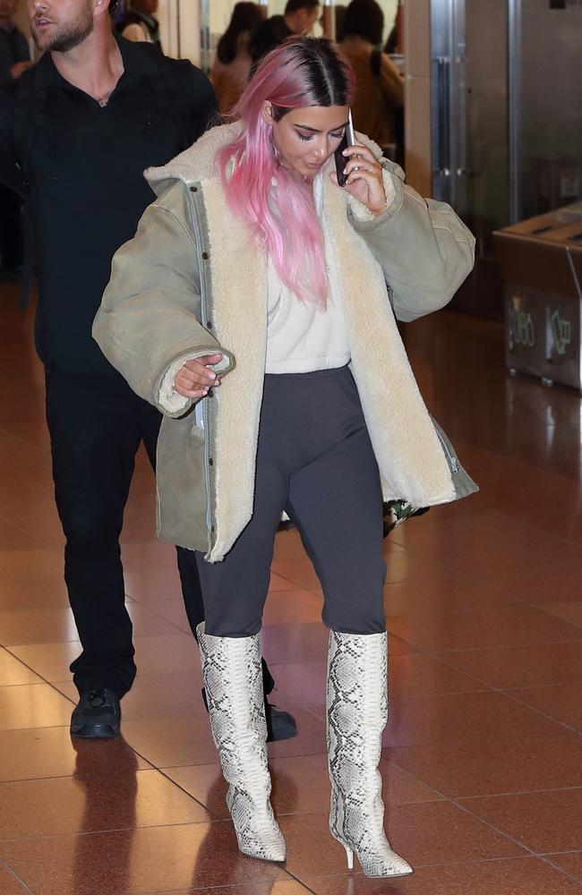 Pink lady! Kim Kardashian showed off her new bubblegum ‘do at Haneda International Airport. Picture: Splash