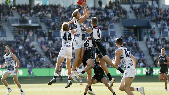 De Koning flies high to take another strong grab in defence. Picture: Darrian Traynor/Getty Images