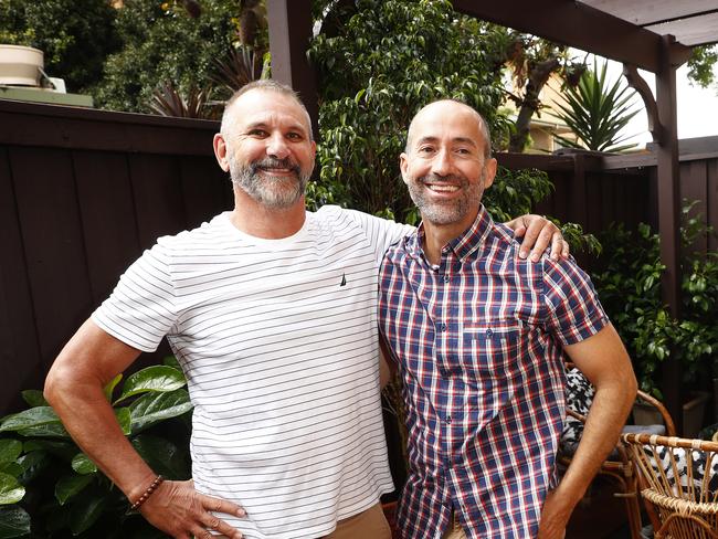 WEEEKEND TELEGRAPHS - 1/11/20*** MUST NOT USE BEFORE CLEARING WITH ST PIC EDITOR JEFF DARMANIN Auction at 79/219 Chalmers st in Redfern. Happy vendors Garrie Russell (left) and Adrian Arratia (right) after the sale. Picture: Sam Ruttyn