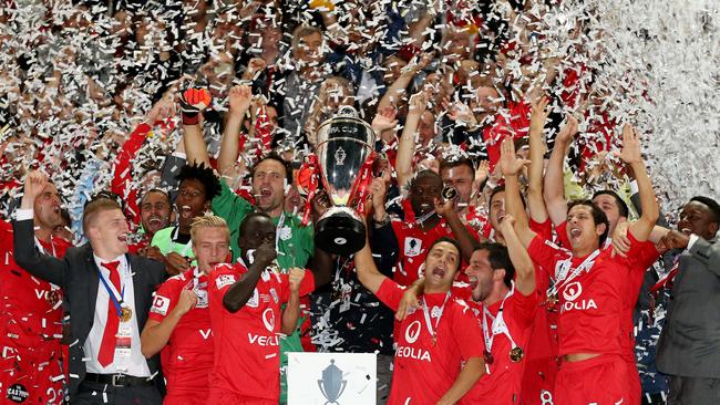 Adelaide United celebrate their 2014 FFA Cup win at Adelaide Oval. Picture: Sarah Reed