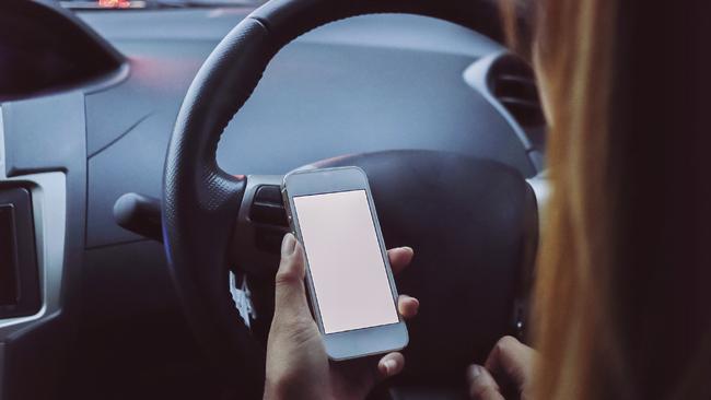 Men and women admitted to using their phones while driving.