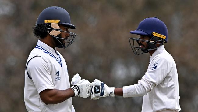 Damith Perera (right) is now a Hawk. Picture: Andy Brownbill