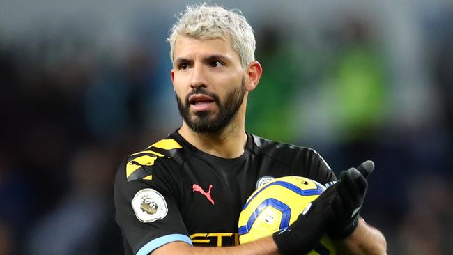 Sergio Aguero celebrates victory with the match ball after he scored a hat-trick against Aston Villa. Picture: Getty Images