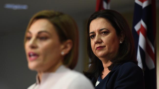 Queensland Premier Annastacia Palaszczuk (right) looks on as Treasurer Jackie Trad speaks on the State Budget. Picture: AAP/Dan Peled