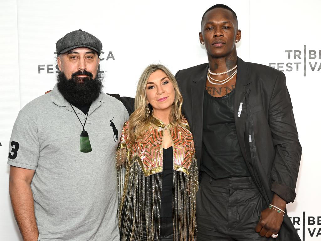 Adesanya (R), with his coach, Eugene Bareman (L) and Zoe McIntosh, who directed ‘Stylebender’. Picture: Roy Rochlin/Getty Images