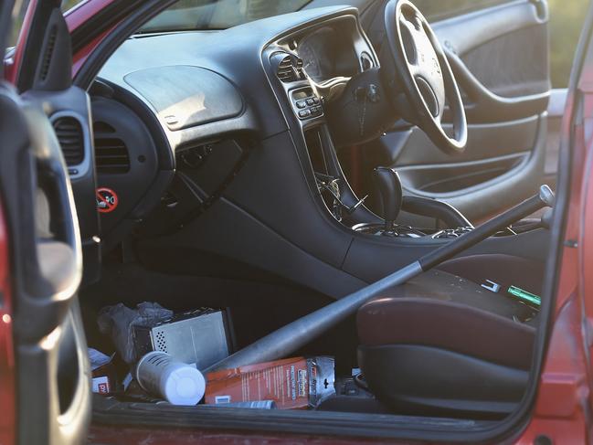 A baseball sits in the smashed car the offenders then hijacked a man's car and fled the scene. Truck vs car Western Ring Road Laverton North. Picture: Nicole Garmston