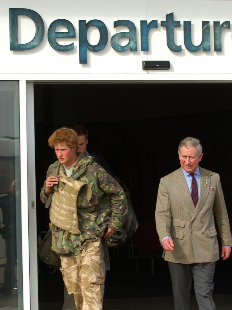 Prince Harry leaves RAF Brize Norton in Oxfordshire, in southern England, with his father Prince Charles after returning from Afghanistan.