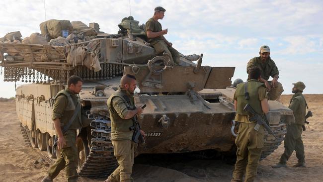 A central tool of Israeli tactics is the armoured bulldozer. Picture: Menahem Kahana/AFP