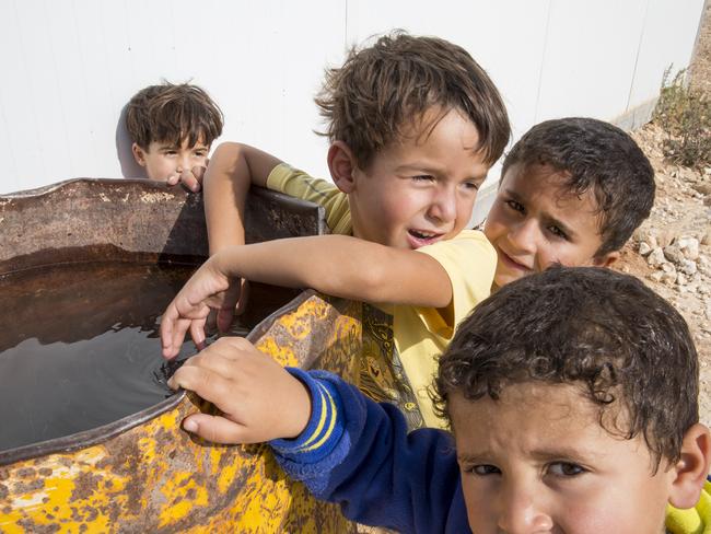 Confronting ... Children inside the Za’atari camp. Picture: Ella Pellegrini