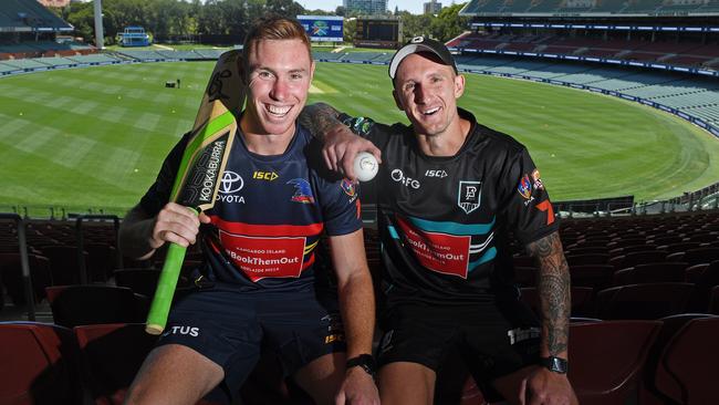 Tom Lynch (Crows) and Hamish Hartlett (Port) at Adelaide Oval to promote the Bushfire T20 Showdownon Sunday, February 2. Picture: Tom Huntley