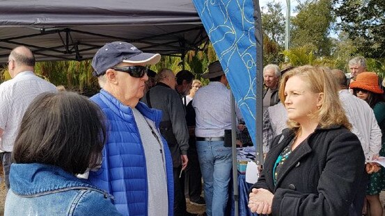 Logan councillor Laurie Koranski with residents at Saturday’s meeting to discuss the site of a new sewage plant.