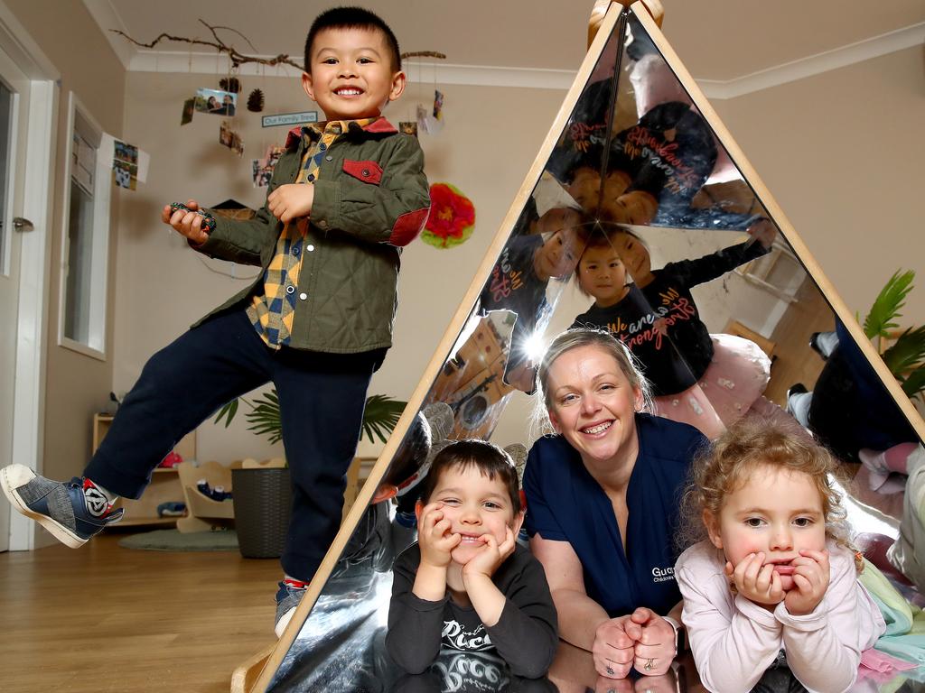 Guardian Childcare and Education centre manager Rebecca Iori pictured with Tyler (top), Hudson, Melody (back) and Clara at their Cherrybrook centre. Picture: Toby Zerna