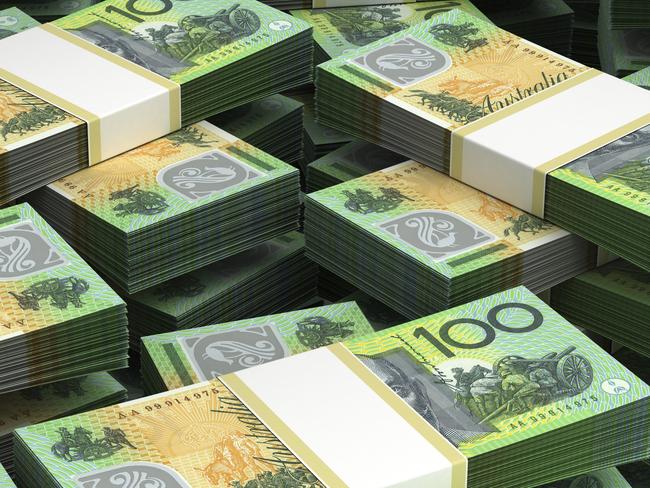 Stack of Australian Dollars. Australian money. $100 bill stacks. Thinkstock