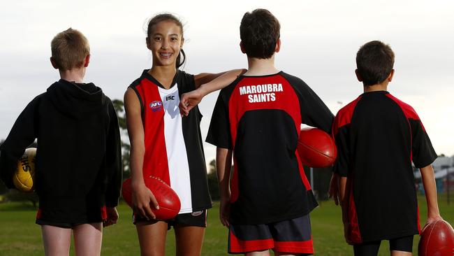 Sienna Reiners -12 , with some of her teams mates from the Mixed team. Sienna plays with both the boys and girls at Maroubra Saints Australian Rules Football club, playing in both the mixed team and above her age in the U15's. Local Sports Star. Picture: John Appleyard