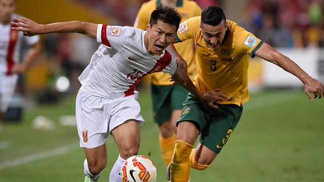 China made life very tough for the Socceroos in the first half.