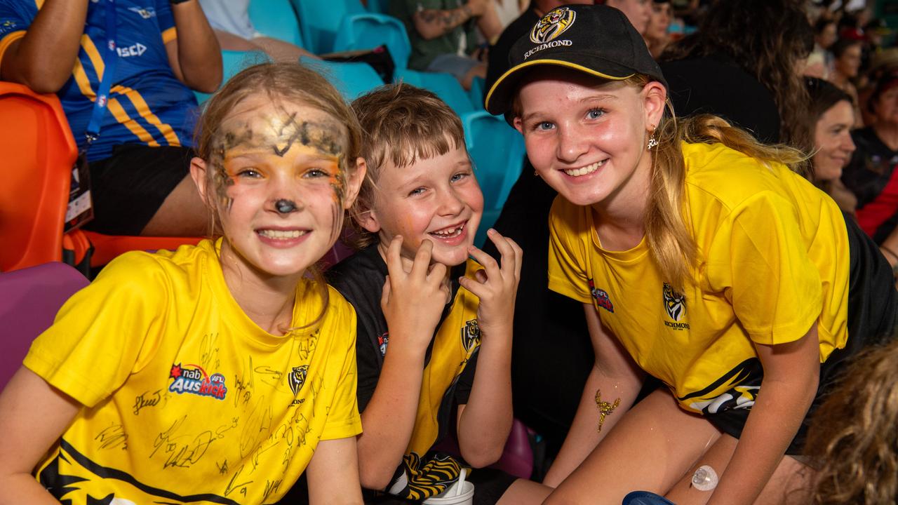 Vada Stephens, Scout Stephens and Airlie Stephens as thousands of fans gathered for the AFLW Dreamtime game between Richmond and Essendon in Darwin. Picture: Pema Tamang Pakhrin