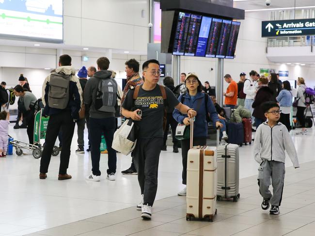 SYDNEY, AUSTRALIA - Newswire Photos - JULY 03 2023: A general view of Sydney Domestic Airport on the first day of school holidays which sees cancellations and delays of some flights due to poor weather and queues of people in Sydney. Picture : NCA Newswire / Gaye Gerard