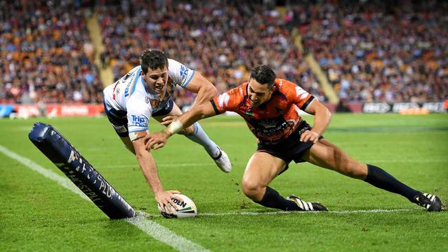 UP THERE WITH THE BEST: Storm player Billy Slater fails to stop Titans player Anthony Don scoring a try during the Round 10 NRL match between the Melbourne Storm and the Gold Coast Titans at Suncorp Stadium in Brisbane, in May this year. Picture: DAVE HUNT