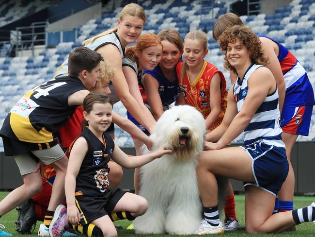 Nina Morrison gets to meet Dulux dog Gerti. Picture: Mark Wilson