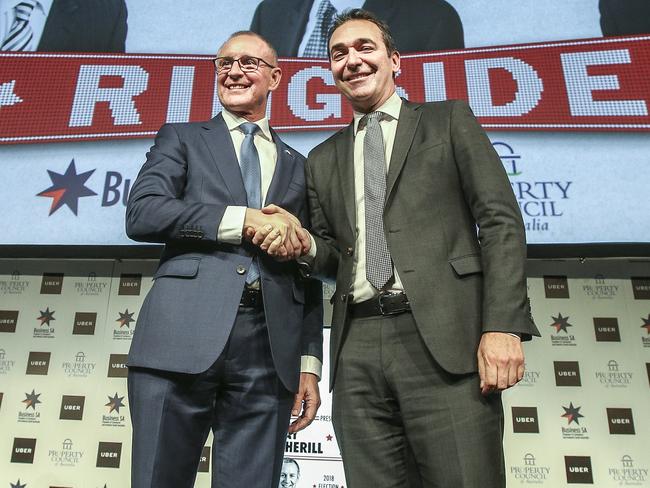 Jay Weatherill and Steven Marshall shook hands ahead of the debate before the gloves came off. Picture: Mike Burton