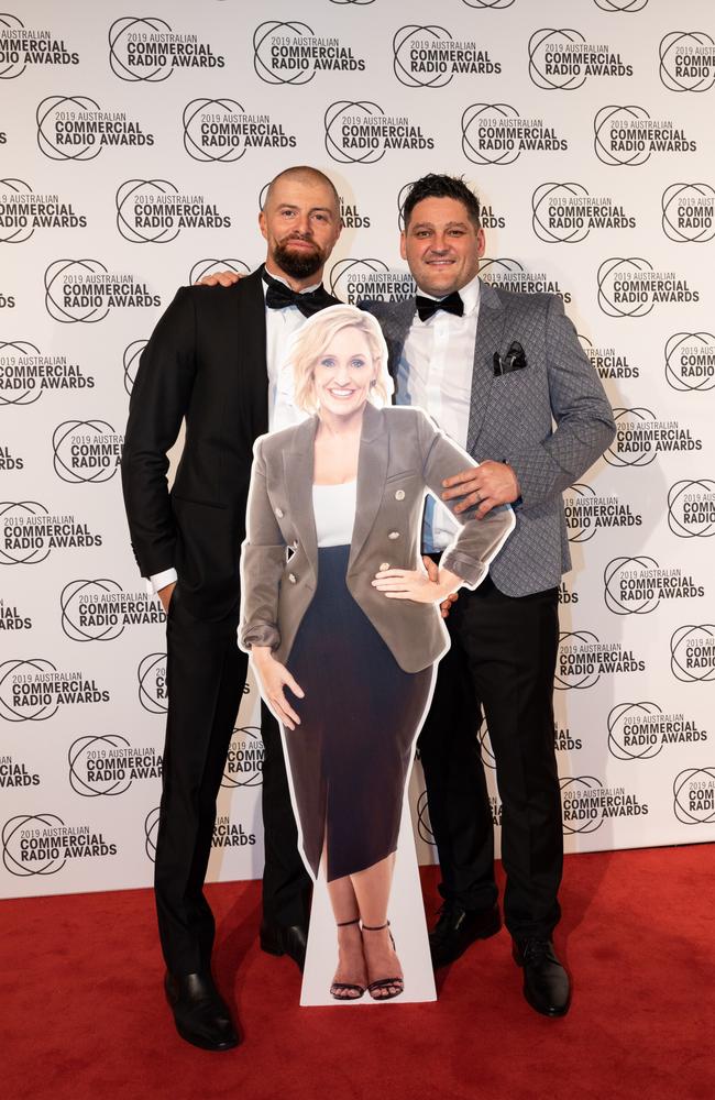 Byron Cooke and Brendan Fevola with a cardboard Fifi Box at the ACRAs. Picture: Supplied.