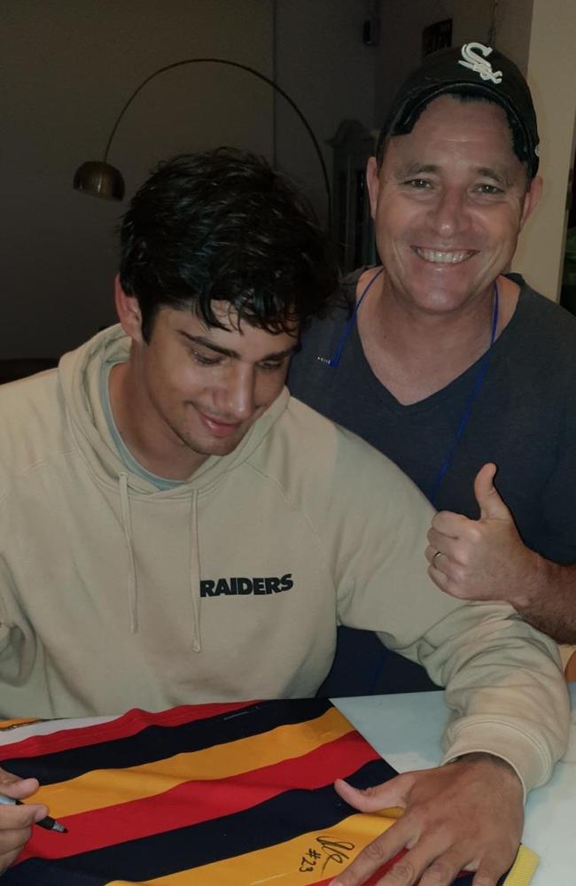 Shane McAdam with former Sturt and Essendon player Shane Radbone — his Adelaide “guardian angel” — on the night he signed with the Adelaide Crows.