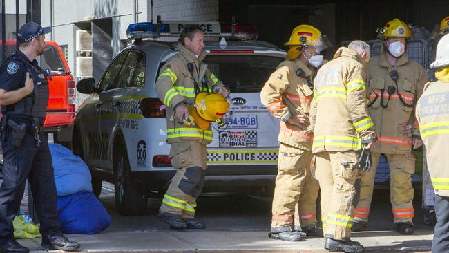 Police and firefighters at The Comfort Hotel Adelaide Meridien in Melbourne St, North Adelaide. Picture: Emma Brasier