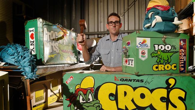 Pickles Townsville branch manager Todd Fellows with Townsville Crocodiles memorabilia that will be auctioned off.