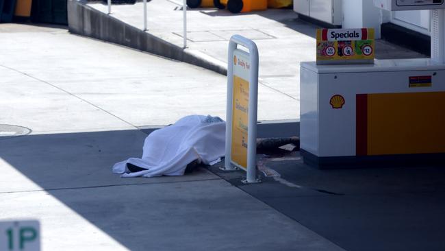 Mr Wallace’s body lies in front of a petrol station at Picton.