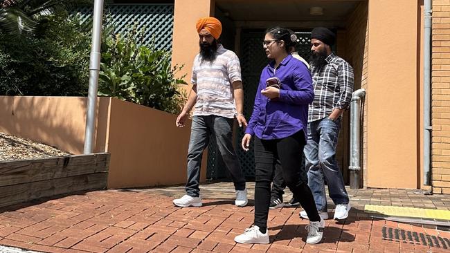 Lovepreet Singh, left, (in orange turban) with support leaving Lismore Courthouse. He remains on bail after receiving costs for the delay in his trial for the crash death of Lindendale farmer Peter Johnston in January, 2022.