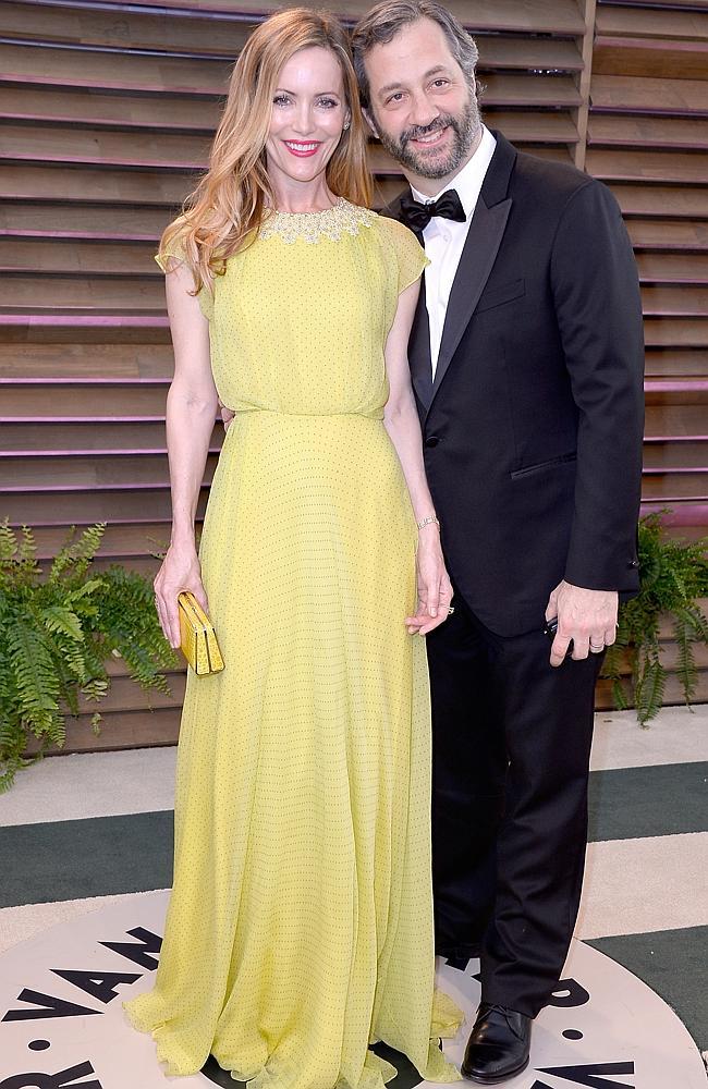 Actress Leslie Mann (L) and director/writer Judd Apatow attends the 2014 Vanity Fair Oscar Party hosted by Graydon Carter on March 2, 2014 in West Hollywood, California.