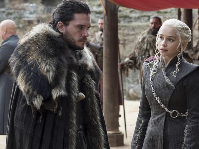 This image released by HBO shows Kit Harington, left, and Emilia Clarke on the season finale of "Game of Thrones." The series set yet another audience record Sunday with its seventh-season finale. Nielsen says an all-time high of 12.1 million viewers were tuned in to the wildly popular fantasy drama. An additional 4 million caught the episode on streaming channels. (Macall B. Polay/HBO via AP)